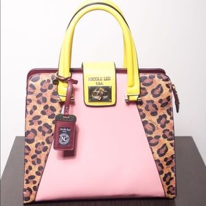 Nicole Lee Multi color purse worn once